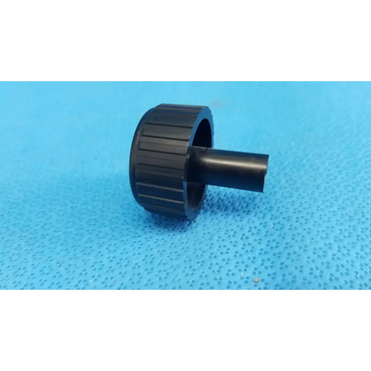 Black plastic ribbed adjustment knob with cylindrical stem for external control panel of topcon trc-nw6s fundus camera