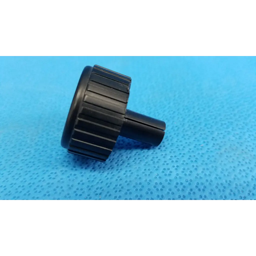 Black plastic ribbed external control panel extension dial adjustment knob with cylindrical stem for Topcon fundus camera