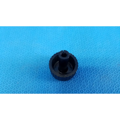 Black plastic external control panel extension dial adjustment knob with textured grip and hexagonal slot for topcon fundus camera