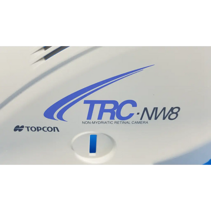 White topcon trc-nw8 non-mydriatic retinal camera with blue branding and main optical body left side shroud housing cover panel