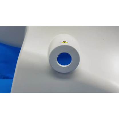 White cylindrical external main optical body side shroud housing cover panel with blue interior and yellow warning label for Topcon fundus camera