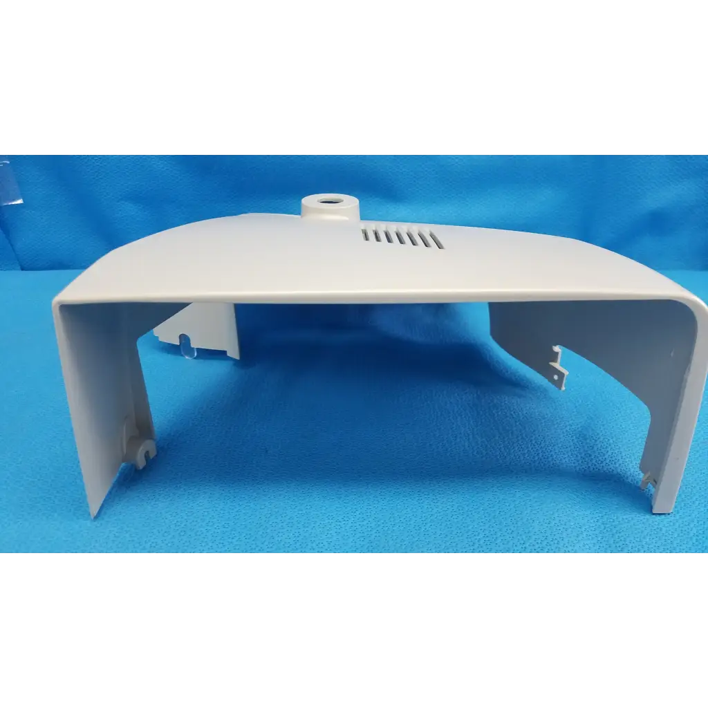 White plastic main optical body side shroud housing cover panel with ventilation slits and mounting tabs for topcon fundus camera