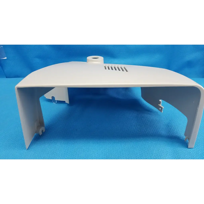White plastic main optical body side shroud housing cover panel with ventilation slits and mounting tabs for topcon fundus camera