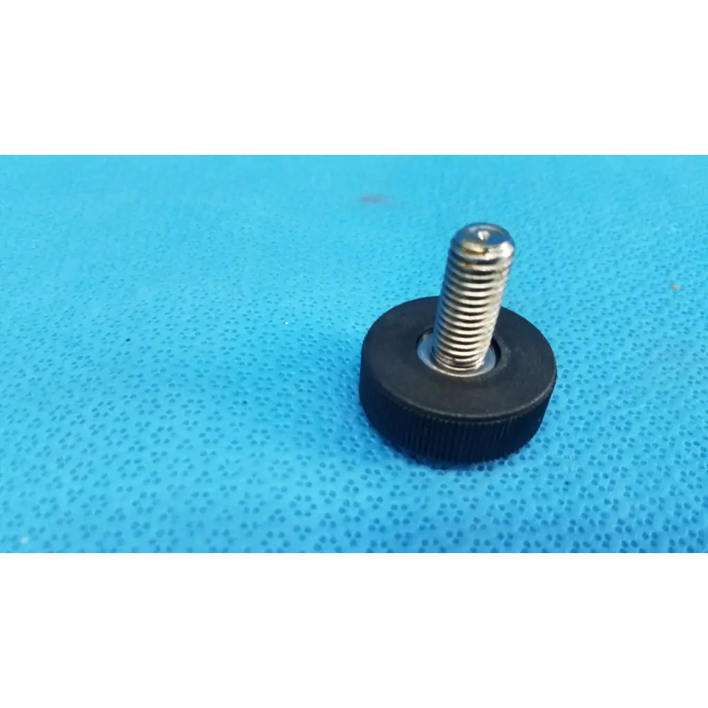 External mechanical leveling screw foot with black rubber cap and shiny silver threaded bolt for topcon trc-nw6s camera