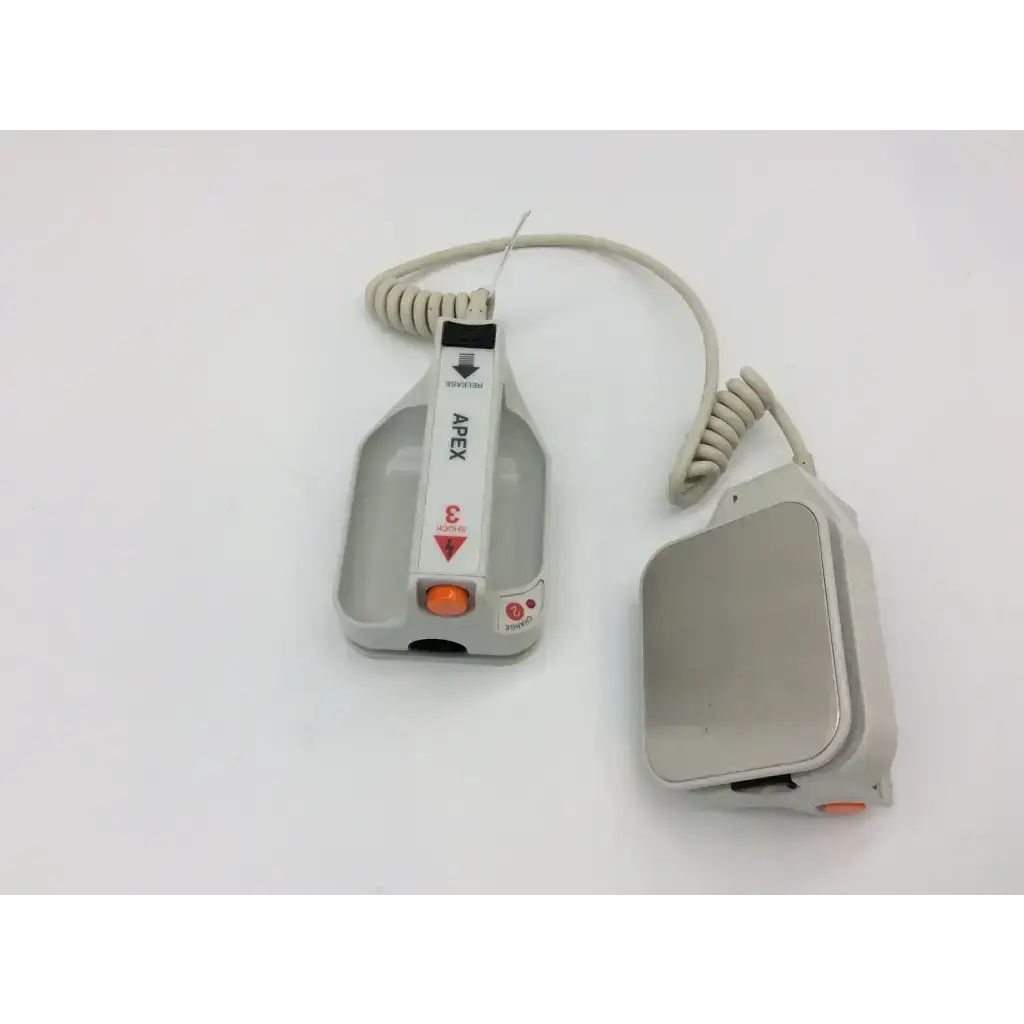 Gray external paddle assembly with orange button and coiled cable for ZOLL E M R X series defibrillators