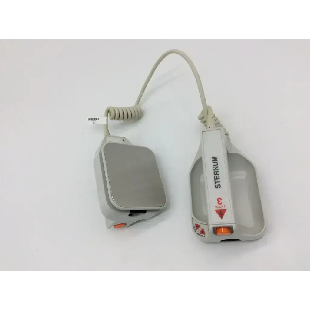 Gray plastic external paddle assembly with orange button coiled cable branded sternum for ZOLL defibrillators