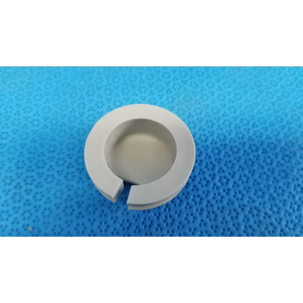 White circular plastic mechanical neck base ring cover with a cutout for Topcon TRC-NW8 joystick neck base