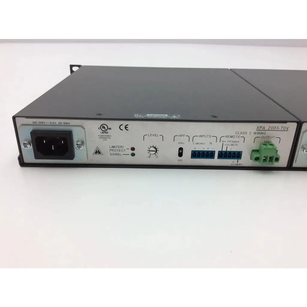 Black metal rack-mount extron xtra xpa 2001 power amplifier with labeled inputs outputs and control knobs
