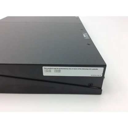 Black rectangular extron xtra xpa 2001 power amplifier with matte finish and white patent label on its side