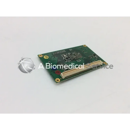 Green rectangular core display driver board with gold-plated connectors and beige ribbon cable for windows embedded ce 6.0