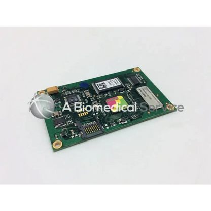 Green rectangular core display driver board with electronic components and white spherical sensor attached on the left side