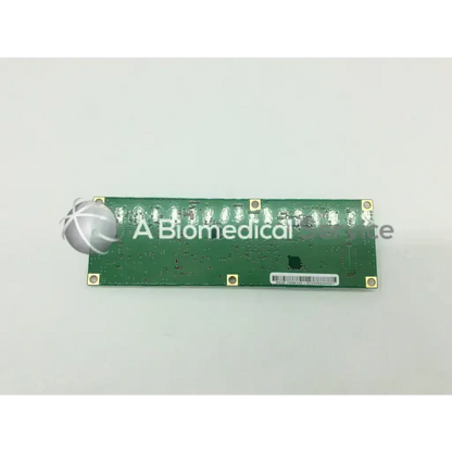 Green rectangular f892xph3-dcdc board with gold mounting screws and silver electronic components along the top edge