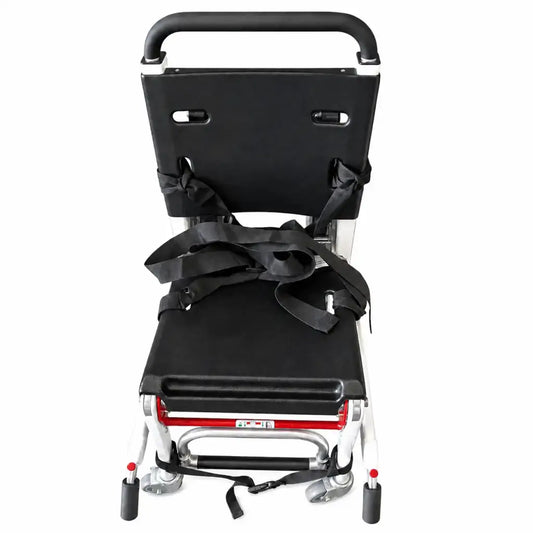 Black padded seat and backrest with adjustable straps on lightweight aluminum frame with red accents and caster wheels for ferno 59-e ez-glide evacuation chair