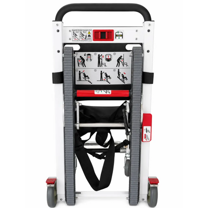 Ferno 59-e ez-glide evacuation chair with white and red foldable stretcher, black straps, and gray side rails for easy transport