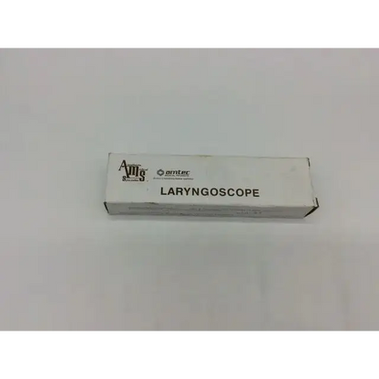 White cardboard box labeled laryngoscope with amia spectrum 3 and omtec logos for fiberoptic waterproof medium handle