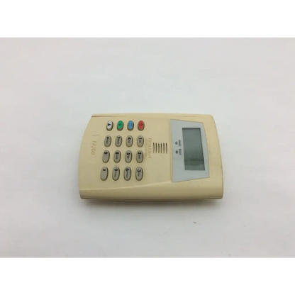 Beige plastic security keypad with digital display and colored buttons from first fa260 wayne alarm systems