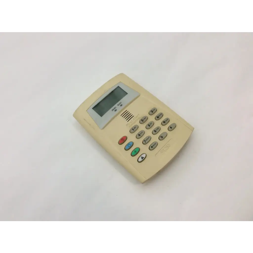 Beige plastic security keypad with digital display and colorful buttons from first fa260 wayne alarm systems product line