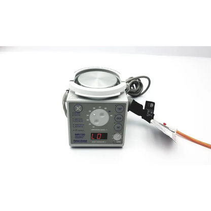 Gray paykel humidifier mr730 medical device with circular top and digital display for respiratory care