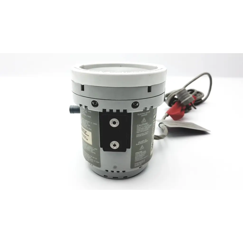 Gray cylindrical industrial pump with white top and black warning labels for fisher and paykel humidifier mr730