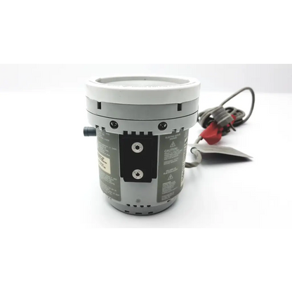 Gray cylindrical industrial pump with white top and black warning labels for fisher and paykel humidifier mr730