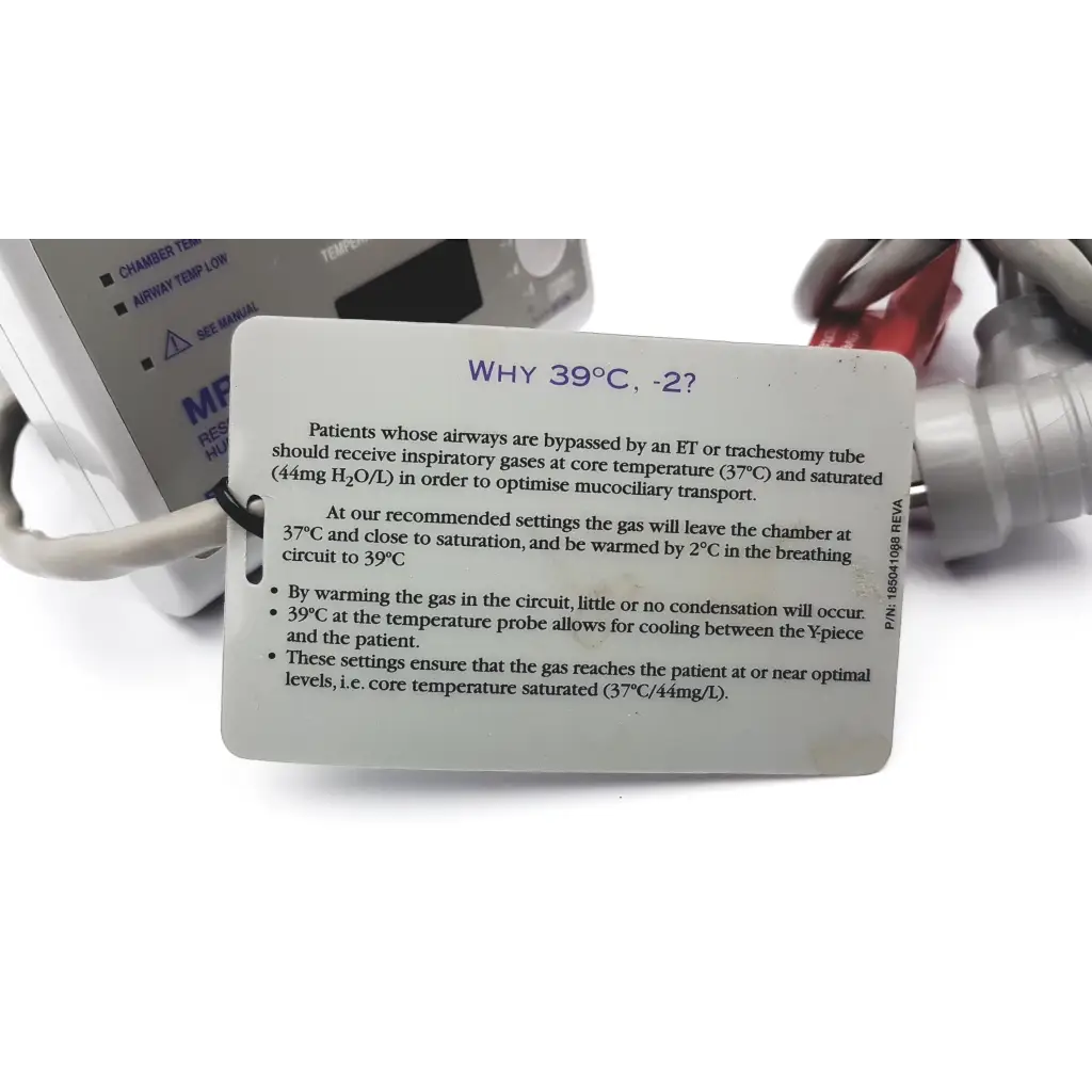 White informational tag with purple text showing medical gas temperature settings on paykel humidifier mr730 respiratory equipment