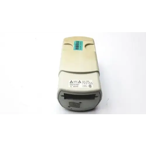 Beige and gray fisher scientific fb300 electrophoresis power supply back with barcode label warning symbols and vents