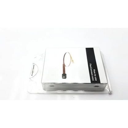 Silver flexconnect mini fiber optic cable in clear plastic packaging for flexconnect mini hearing aid strips no 117468