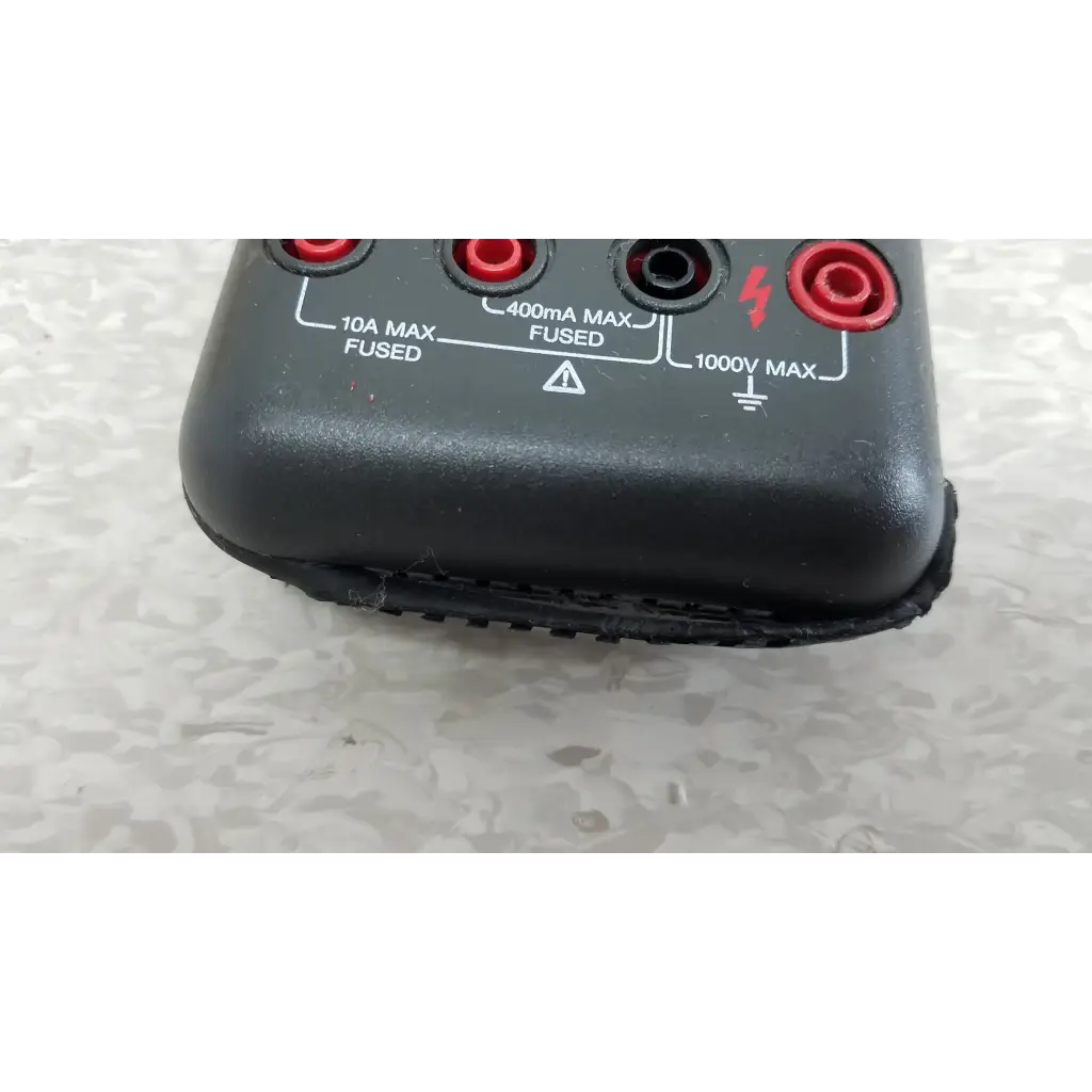 Black plastic fluke 87 true rms digital handheld multimeter with red and black test probe jacks for 1000v max measurements