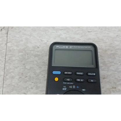 Black fluke 87 true rms digital handheld multimeter with digital display and multiple function buttons for precise measurements