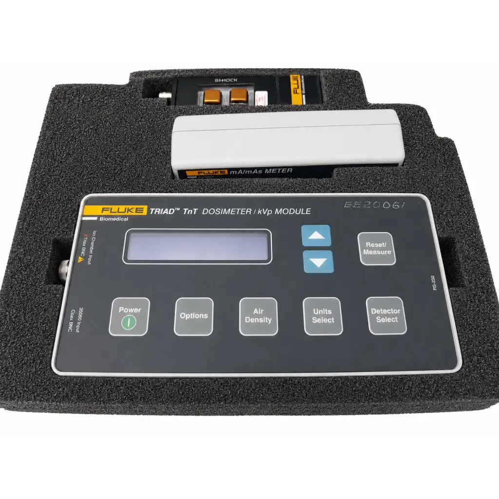 Fluke biomedical triad tnt dosimeter kvp module with black silver casing digital display and labeled control buttons for field service