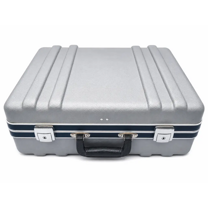 Silver textured hard-shell briefcase with black leather handle and navy blue stripes for fluke biomedical triad tnt field service kit