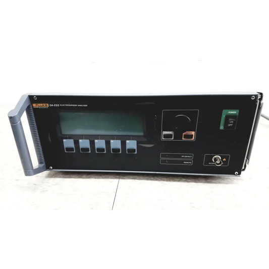 Black fluke biomedical qa-esii electrosurgery analyzer with digital display and control buttons for precise testing