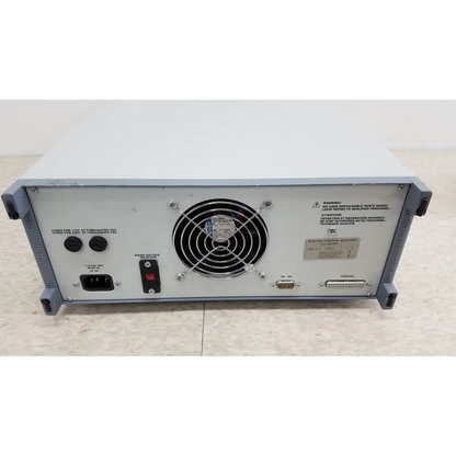 Backside of gray metal fluke biomedical qa-esii electrosurgery analyzer with circular fan grille and multiple ports