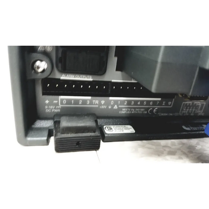 Black plastic alarm system panel with labeled terminals and certification markings on fluke hydra series ii data acquisition unit with 2645a universal input module