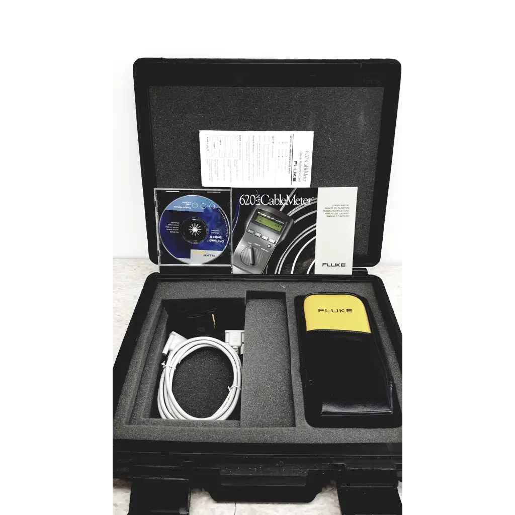 Fluke networks 620 lan cablemeter in black carrying case with yellow cover and coiled white cables for cable testing