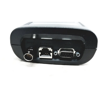 Black fluke networks lan cablemeter back side showing circular port ethernet and db9 serial port for cable testing