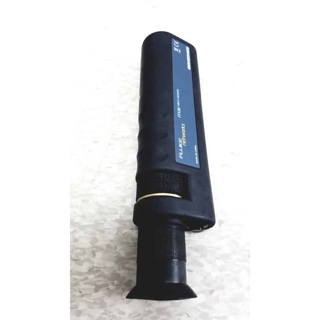 Black fluke networks ftk1300 simplifiber pro fiber optic test kit with textured grip and blue label featuring white text