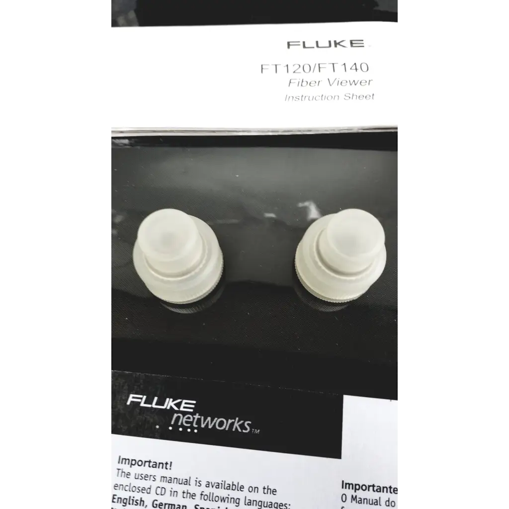Two off-white translucent plastic fiber optic connectors for fluke ft120 ft140 in ftk1300 simplifiber pro test kit