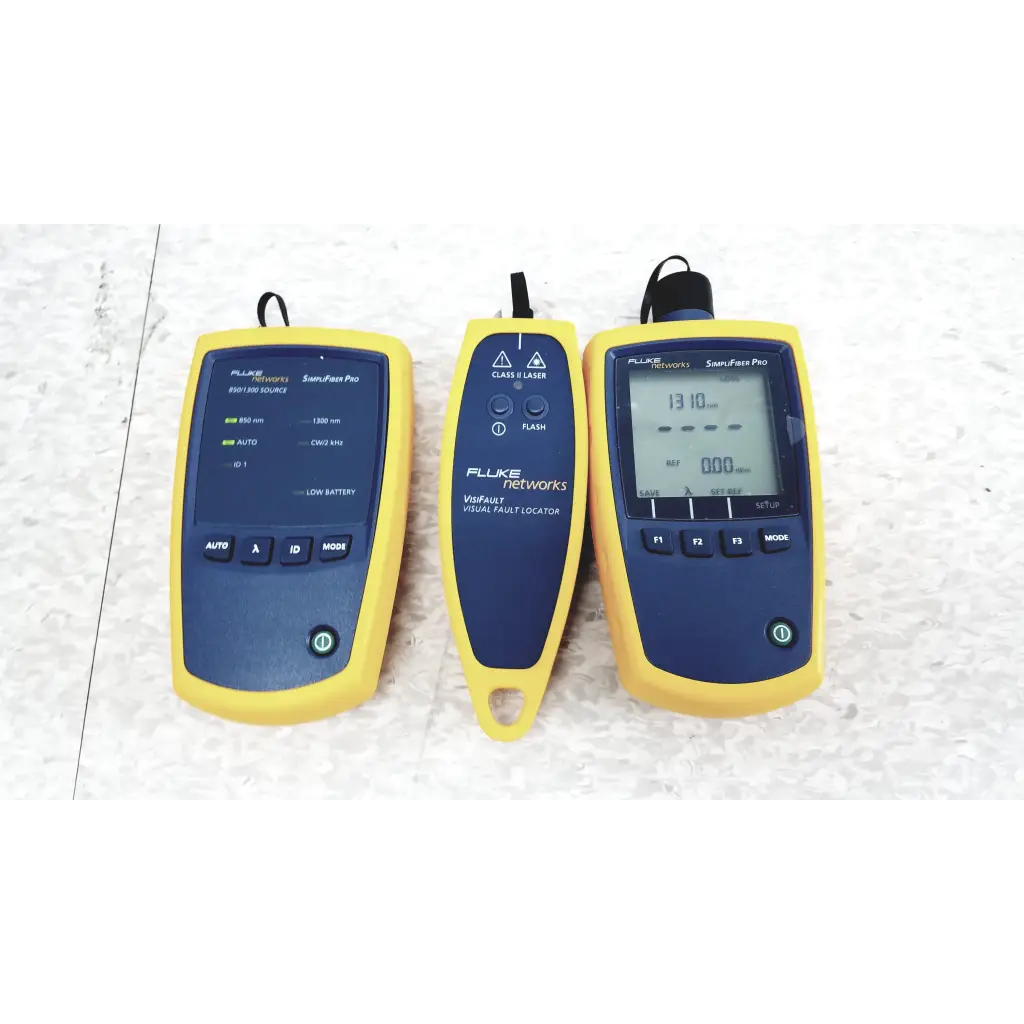 Three yellow and blue fluke networks ftk1300 simplifiber pro fiber optic test kit tools including cable tester laser pointer and multimeter