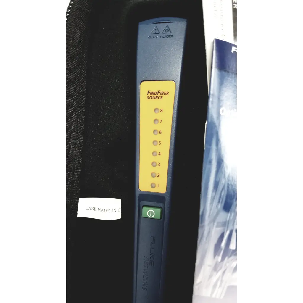 Blue and yellow findfiber source laser tool with numbered indicator lights in fluke networks ftk1300 simplifiber pro fiber optic test kit