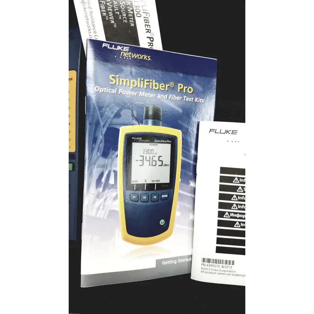 Yellow and blue fluke networks ftk1300 simplifiber pro fiber optic test kit with digital optical power meter showing -346.5 dbm