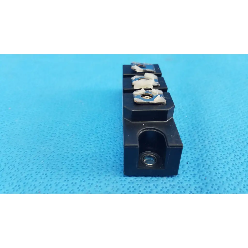 Black plastic tool holder with three metallic inserts for fuji electric 2fi100g-100c dual diode power diode module