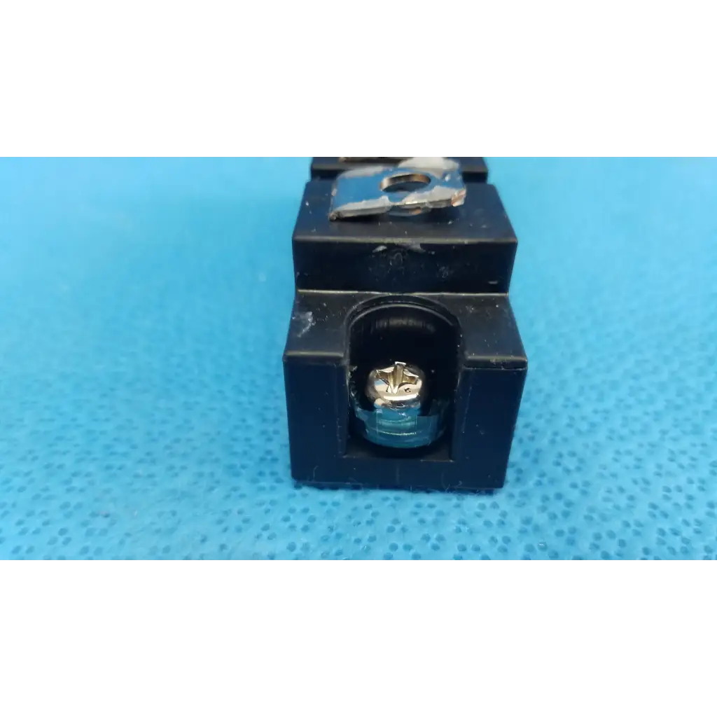 Black plastic electrical terminal block with silver screw and metal clamp for fuji electric dual diode power diode module