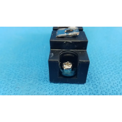 Black plastic electrical terminal block with silver screw and metal clamp for fuji electric dual diode power diode module