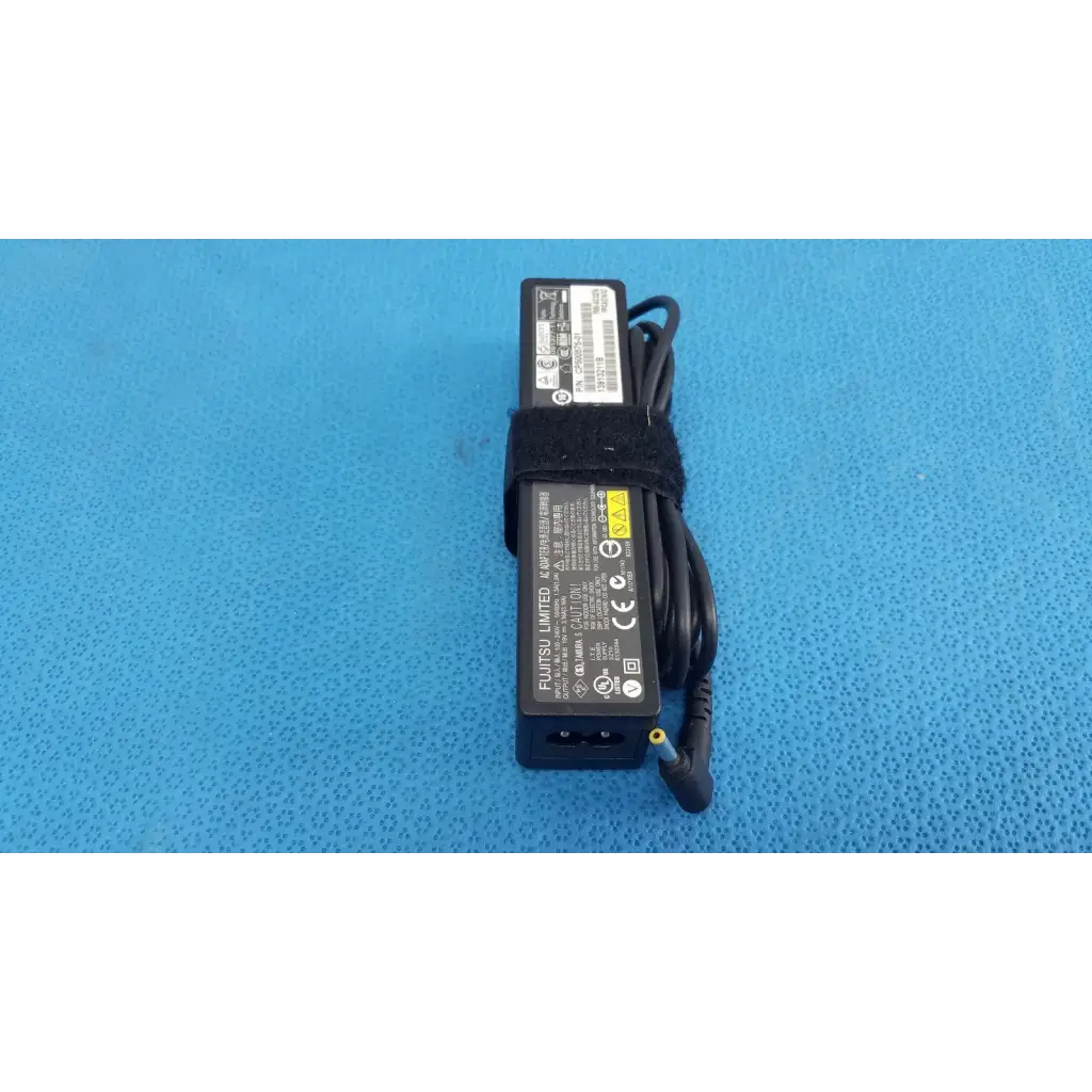 Black plastic fujitsu ac adapter power supply 19v 3.16a with coiled cable and black velcro strap for laptops