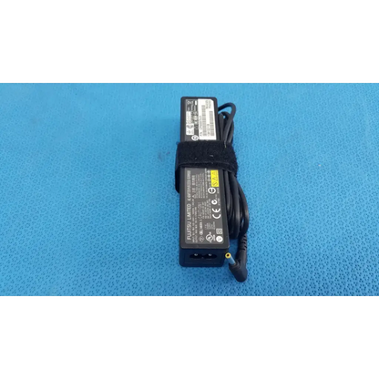 Black plastic fujitsu ac adapter power supply 19v 3.16a with coiled cable and black velcro strap for laptops