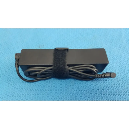 Black rectangular fujitsu ac adapter power supply 19v 3.16a with coiled cord and velcro strap for laptop charging