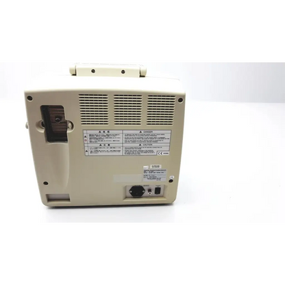 Beige fukuda denshi uf-750xt portable ultrasound system showing ventilation grilles and warning labels on the back side