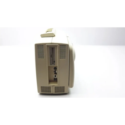 Beige plastic vintage-style portable ultrasound device with handle and ventilation grilles fukuda denshi uf-750xt