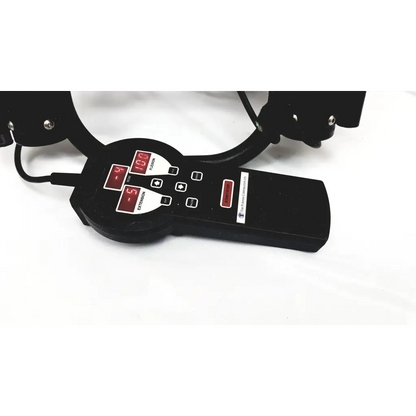 Black electronic headgear control unit with red digital displays and labeled buttons for extension and flexion by furniss corporation phoenix